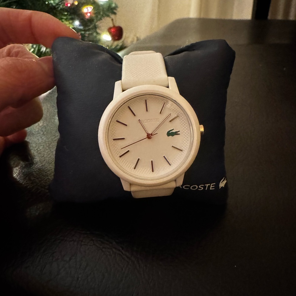 Lacoste white watch with silicon strap UNISEX. It’s new - worn 5 times.